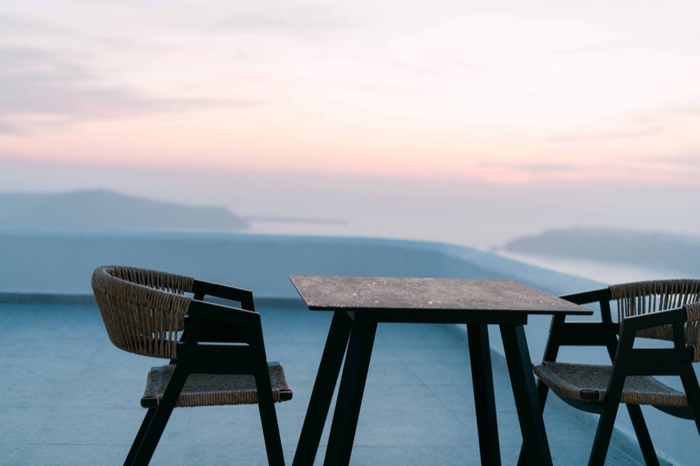 Dramatic cliffs at Imerovigli, Santorini Greece – destination wedding photography Saphir Weddings