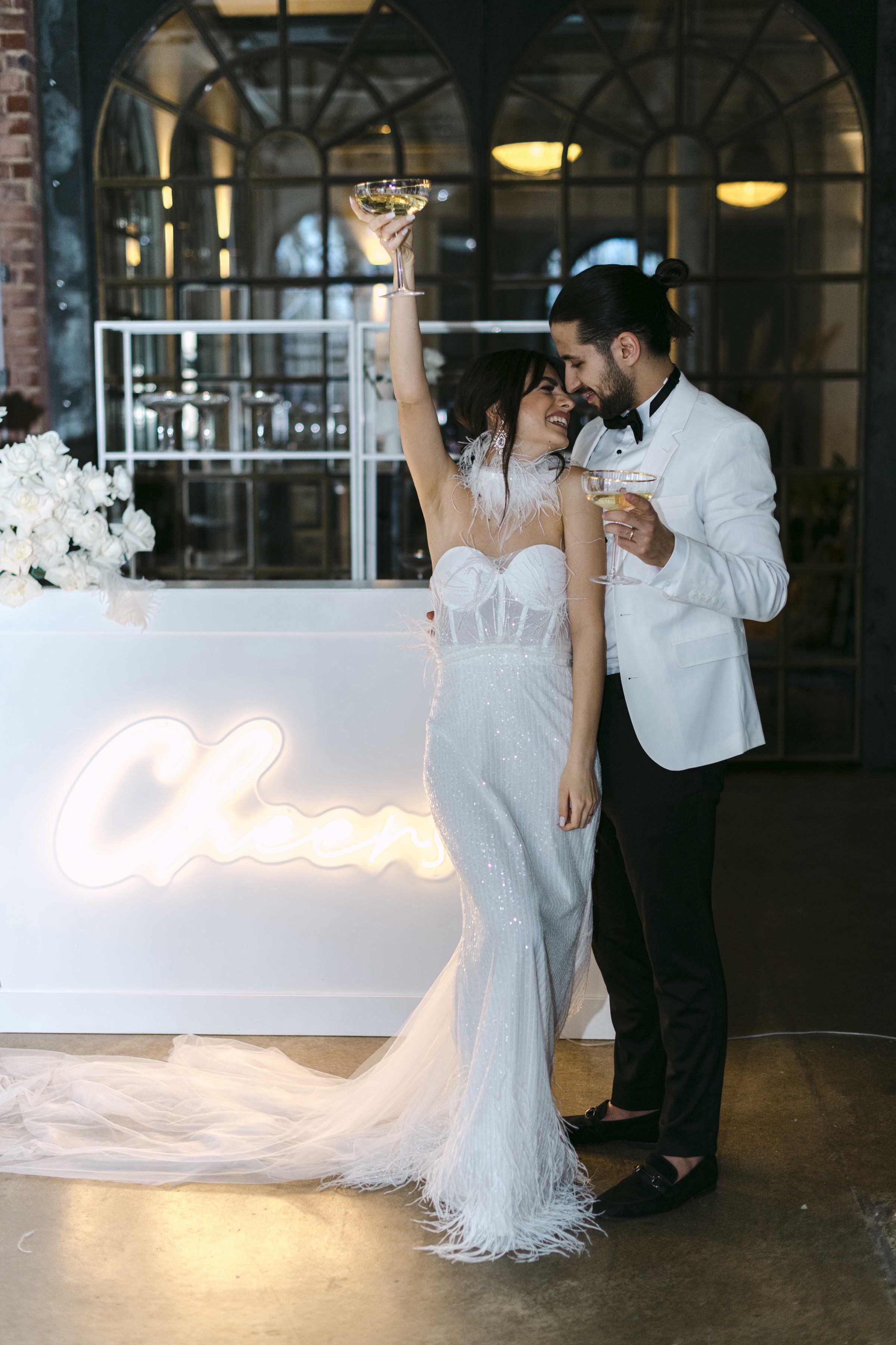 Atmospheric neon bar at wedding reception – glamour wedding photography Saphir Weddings